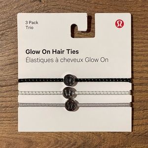 NWT Lululemon women’s “glow on hair ties” 3 pack. Brand new O/S Black White Gray